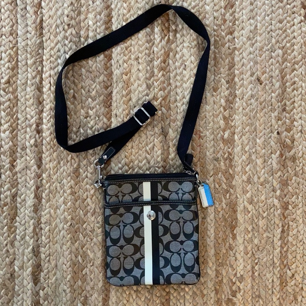 Coach cross body purse. Black and gray. Great condition.